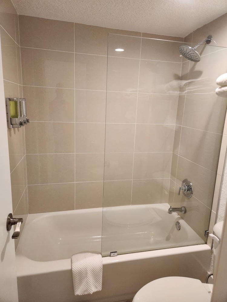 Bath tub/shower in bathroom